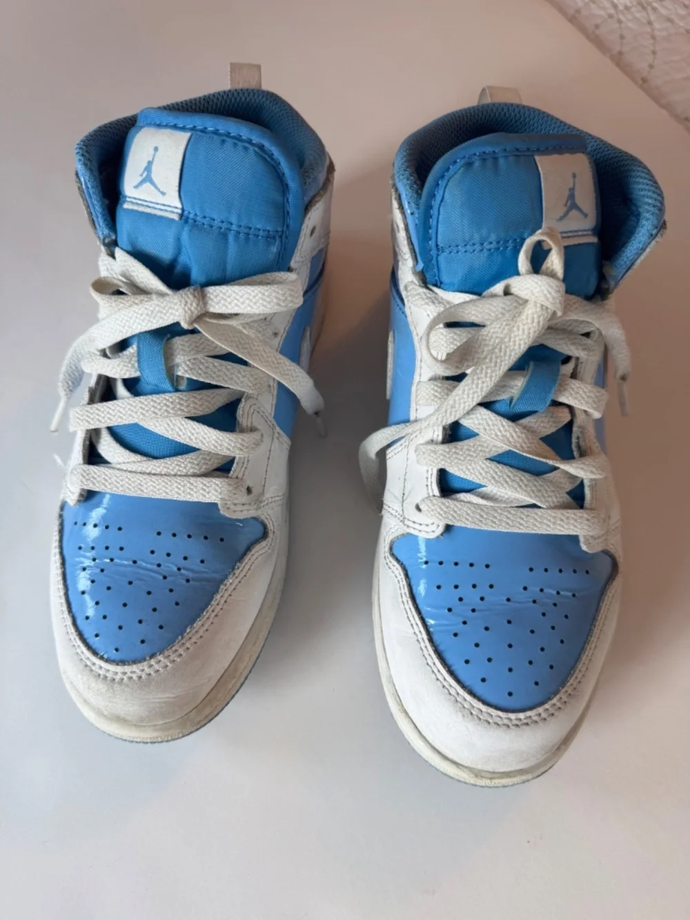 Air Jordan I Mid Youth size 3Y. Light blue and white.